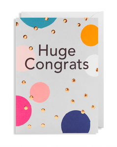 Brightly coloured circles on a grey background and some small scattered gold dots. With the words Huge Congrats