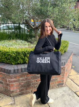 Load image into Gallery viewer, This black recycled bag has bold silver glitter KILLER QUEEN on it