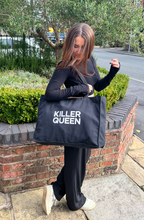 Load image into Gallery viewer, This black recycled bag has bold silver glitter KILLER QUEEN on it