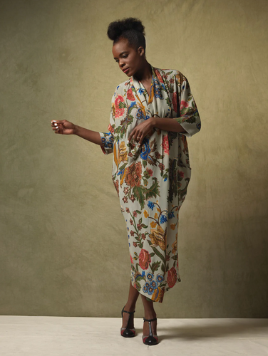 This loose fitting dress with a scoop neck  vase print mimics delicate silk floral embroidery in an array of vibrant colours