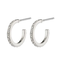 Load image into Gallery viewer, A semi hoop earring in shiny silver plated metal. Clear crystals add sparkle to the full earrings. With a post fastening. 