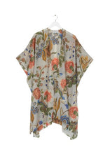 Load image into Gallery viewer, In a lightweight fabric, this throwover kaftan style is floaty and so easy to wear. With an open front and loose sleeves, wear it open or tie the front for a knotted detail. In an all over print. 