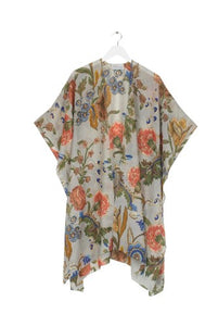 In a lightweight fabric, this throwover kaftan style is floaty and so easy to wear. With an open front and loose sleeves, wear it open or tie the front for a knotted detail. In an all over print. 