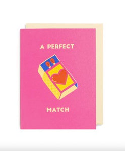 A perfect valentine's card with the words " a perfect match' and a freestyle painting of a matchbox with two matches in it and a heart on the front.