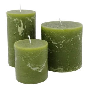 Deep green pillar candles in three different sizes