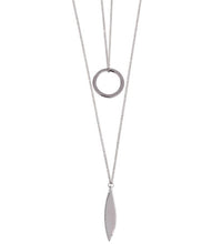 Load image into Gallery viewer, A long ladies necklace in a silver colour. A double strand necklace but attached together for the ease of just putting on one necklace but having a layered look. The longest chain features a leaf shape pendant and the shorter chain a circular pendant. With clasp fastening and extender chain.