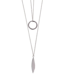 A long ladies necklace in a silver colour. A double strand necklace but attached together for the ease of just putting on one necklace but having a layered look. The longest chain features a leaf shape pendant and the shorter chain a circular pendant. With clasp fastening and extender chain.