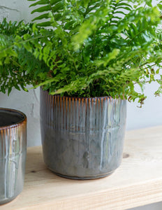 Grey glazed indoor plant pot with vertical linear design