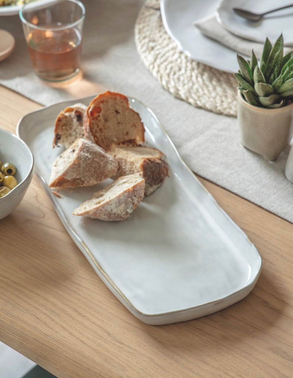 White ceramic platter with matching pieces. Perfect to serve bread , meat platters or salads