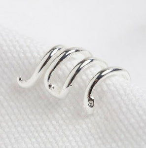 Made from sterling silver plated brass, this ear cuff is a sleek and simple twisted design of a snake. perfect if you do not have a permanent cartillage, simply slip it over your ear.
