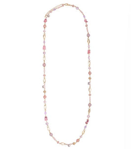 Long pink beaded and gold metal necklace. Pink beads of various shades, shapes and sizes. Clasp fastening to the back with adjustable length. Nickel free.