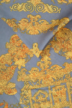 Load image into Gallery viewer, A ladies scarf measuring 110cm x 110cm in a grey and mustard baroque style print. Super soft and silk like drapey fabric.