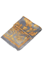 Load image into Gallery viewer, A ladies scarf measuring 110cm x 110cm in a grey and mustard baroque style print. Super soft and silk like drapey fabric.