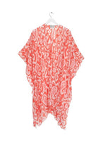 Load image into Gallery viewer, In an Ikat pink print design, this lightweight ladies throwover is delicate in nature. It drapes beautifully and is worn loose. With loose arms and a front which can be tied.