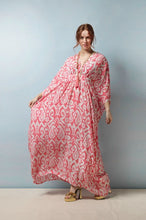 Load image into Gallery viewer, With its bohemian floor-length fit, this kaftan flatters all body shapes – an empire line bust with ¾ length drop shoulder sleeves, V-neck and front subtle gathering that defines your figure without compromising on comfort. In a traditional Ikat pink print.