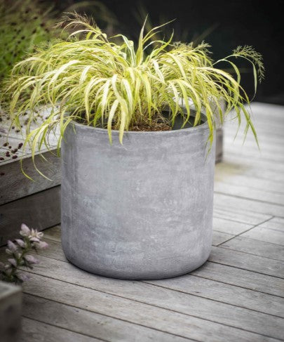 A weatherproof and frostproof grey fibre clay planter for outdoors. A minimalist block style. 
