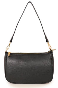 A classic womens baguette leather handbag. With a gold zip fastening to the top and gold metal hardware, it has two detachable straps, one is shorter and shoulder length, and the longer adjustable strap is perfect for across the body. Fabric lined with a zipper inner pocket and two fabric pockets. 