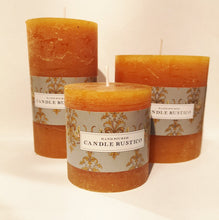 Load image into Gallery viewer, Burnt orange candles in three sizes