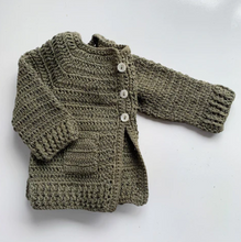 Load image into Gallery viewer, Ethically handmade this beautiful crochet baby cardigan is the ideal new baby gift. Using soft 100% Organic Cotton it is the perfect layering item for a new baby. In size 0-3 months and available in two colours.  Designed to be a classic timeless piece, it will be passed down through the family and become an heirloom piece for future generations. 
