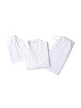 Load image into Gallery viewer, A pair of white, textured, double layer luxurious, sustainably sourced cotton pyjamas 