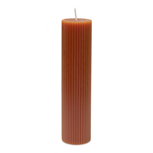 At tall pillar candle 20 X 5 cm with a ribbed surface in a warm caramel orange colour.