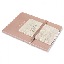 Load image into Gallery viewer, A set of two notebooks in different sizes. The large is in a dusty antique rose with a metallic rose gold elastic band holding the second in place. The large book has the words I LOVE YOU written on it in gold. The small book is a soft green with gold spatters on it and the word NOTEBOOK on it. A lovely gifting set  for someone you love