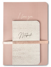 Load image into Gallery viewer, A set of two notebooks in different sizes. The large is in a dusty antique rose with a metallic rose gold elastic band holding the second in place. The large book has the words I LOVE YOU written on it in gold. The small book is a soft green with gold spatters on it and the word NOTEBOOK on it. A lovely gifting set  for someone you love