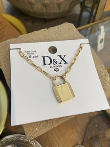 This link necklace features a padlock pendant to the front. With a clasp fastening and extender chain. Available in gold plated or stainless steel. Nickel free