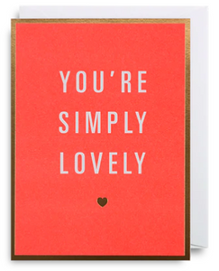 Mini card with the words You're Simply Lovely on the front, perfect for many occasions. W90mm x H120mm. Blank inside for your own message. Comes complete with a white envelope. Neon Orange colour with white wording, and gold coloured border to the edge. Lovingly printed in England.