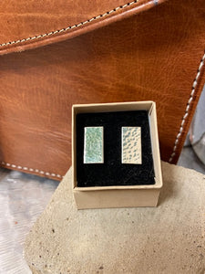A rectangular shaped cufflink with a hammered finish. A timeless design. Sterling Silver 925.