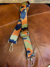 Load image into Gallery viewer, A detachable and adjustable bag strap. In navy, orange and gold glitter camouflage print. Woven and soft and comfortable to wear. With gold hardware and clips to simply attach to your bag. 