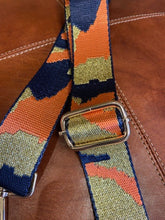 Load image into Gallery viewer, A detachable and adjustable bag strap. In navy, orange and gold glitter camouflage print. Woven and soft and comfortable to wear. With gold hardware and clips to simply attach to your bag.