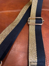 Load image into Gallery viewer, Black and gold glitter stripe detachable and adjustable strap, with gold hardware and clips so you can simply attach it to your favourite handbag.