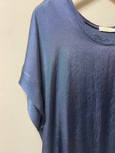 Load image into Gallery viewer, A silky fabric boxy style top. With short sleeves and a scoop neck, the fabric has a shimmer to it. With a double layer to the cuffs, neckline and hem, it is a luxe ladies top.