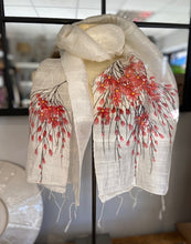 Load image into Gallery viewer, A hand painted pure silk ladies scarf. a pure silk cream coloured scarf with hand painted cherry blossoms to each end. Each scarf is truly unique with no two being the same. Hand painted by local ladies in Vietnam. the scarf has delicate tassels to each end. 