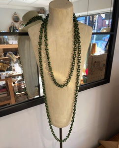 A long ladies necklace, handmade from bamboo beads attached to metal loops to create the long necklace. Wear it as it is, or wrap around to create a shorter necklace. Choose from a selection of colours. Made in Vietnam.