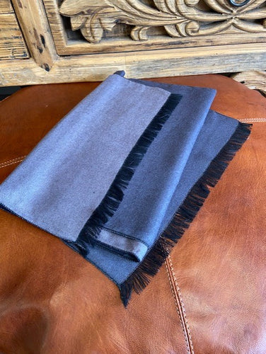 A pure cashmere mens scarf in a classic rectangular shape with fringed ends for extra detail. Supersoft and luxurious in classic colours. 