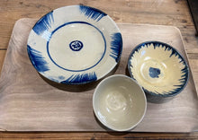 Load image into Gallery viewer, With a diameter of 9.5cm these small dipping bowls are perfect for your sauces and dips. Handmade and hand painted in Vietnam no two are the same. Made from pottery, with a beige cream colour and the design is hand painted on in dark blue.